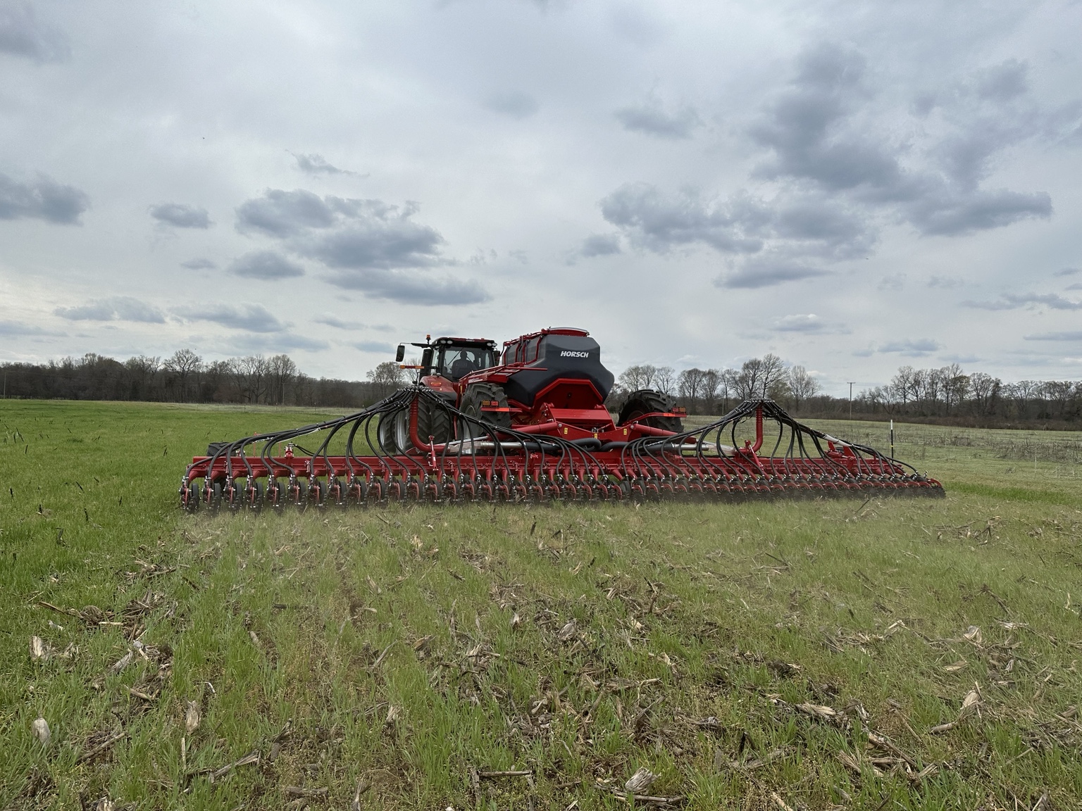 Large seeding rig planting into a green cover crop